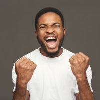 Success, excited black man with happy facial expression