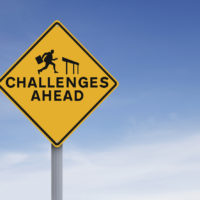 A conceptual road sign on challenges or obstacles